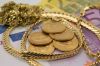Foto: Goldkette und Münzen